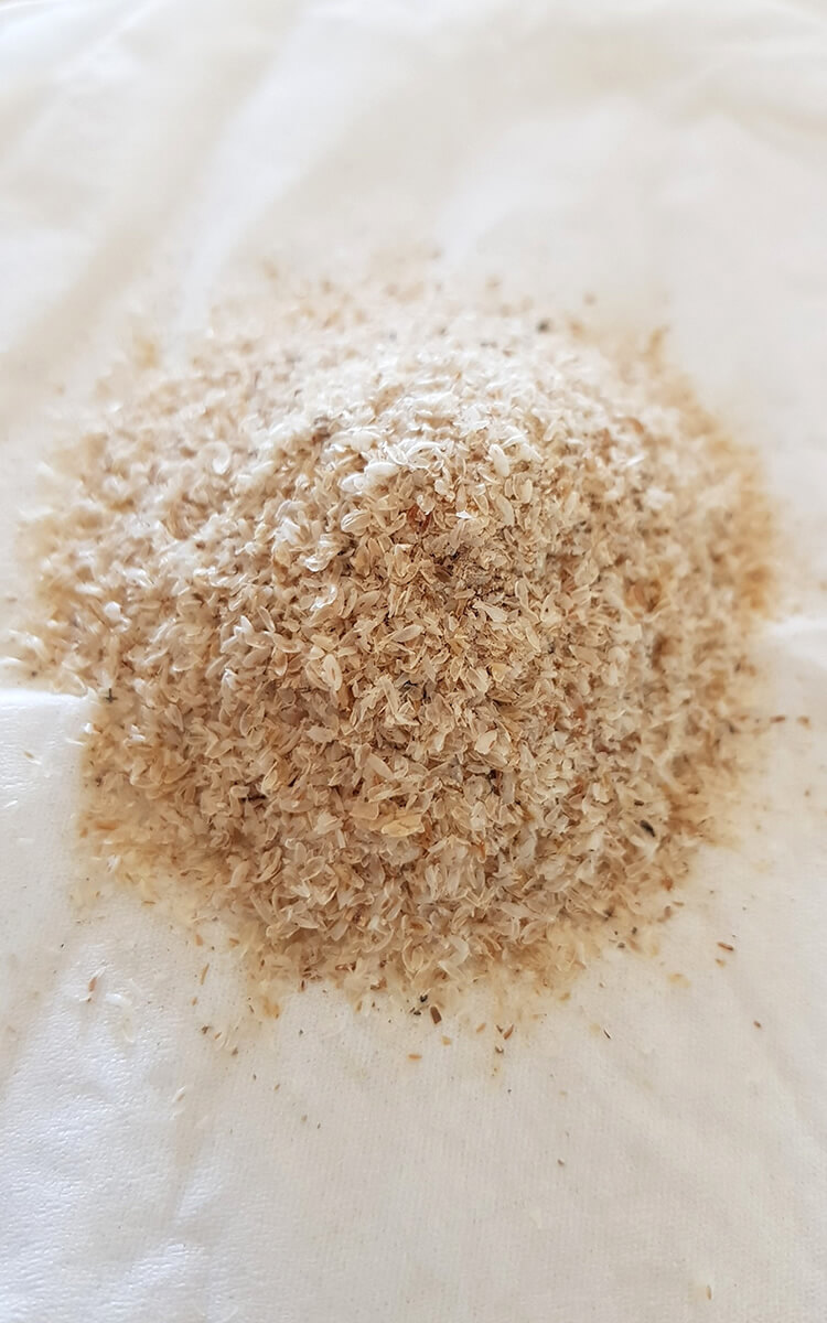 raw organic psyllium husk on table