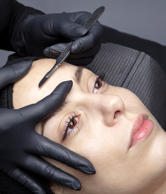 woman having a dermablading session