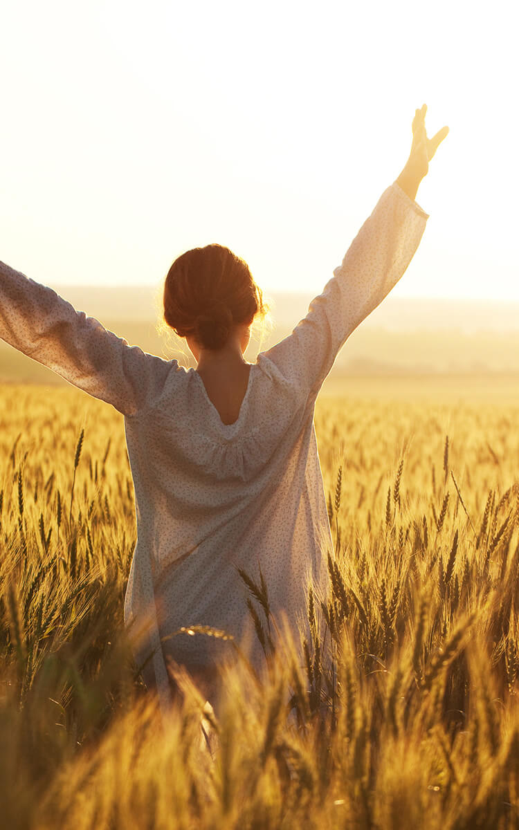 happy woman in the golden fields