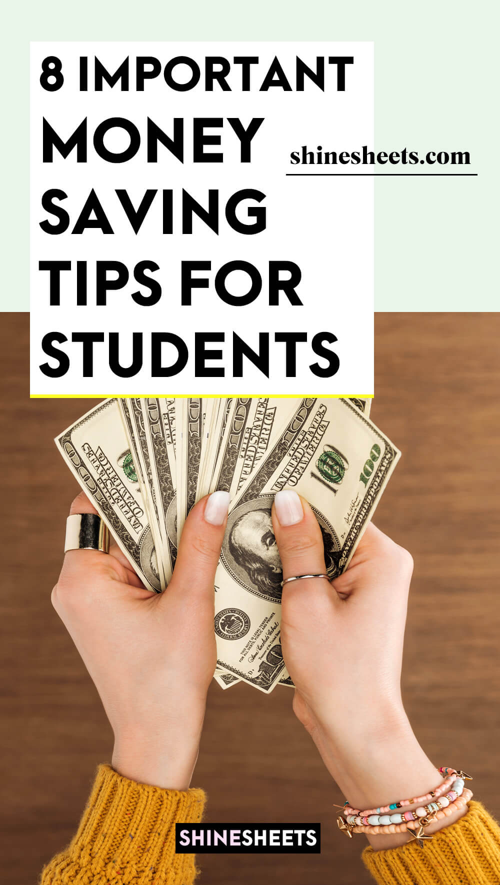 student holding money in her hands