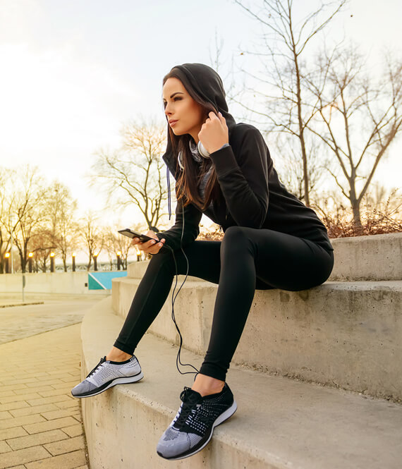 woman listening to self improvement audio book