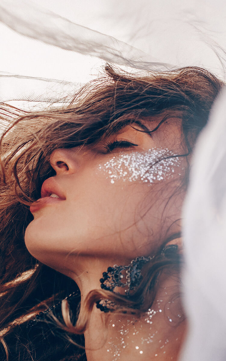 woman using sea salt skin care product on her face