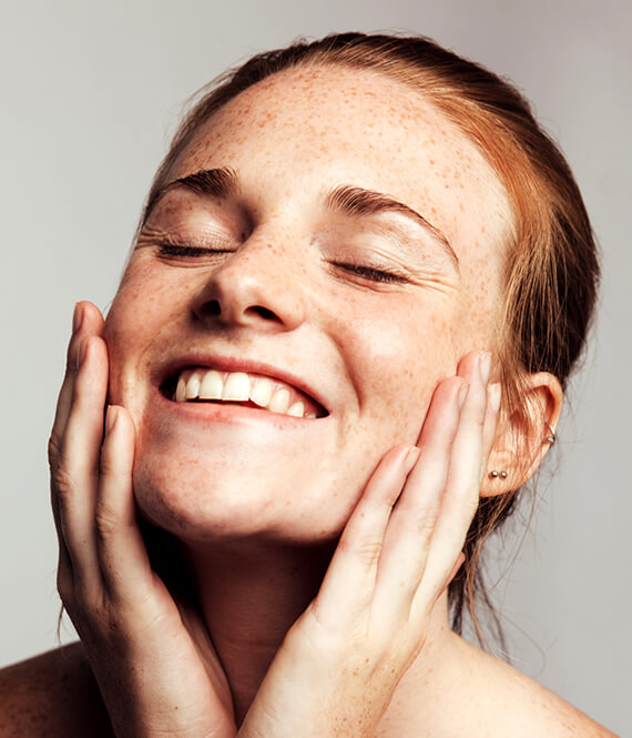 happy woman after a rhinoplasty
