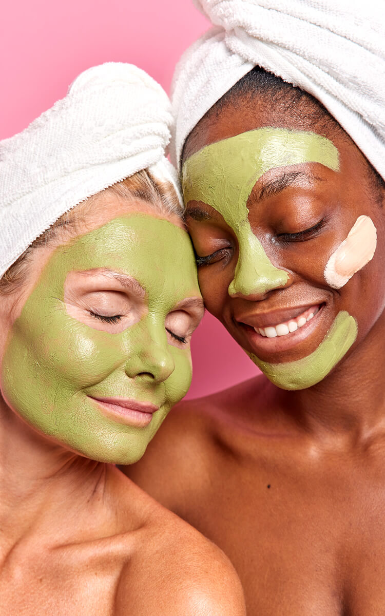multiethnic young and older women with face masks
