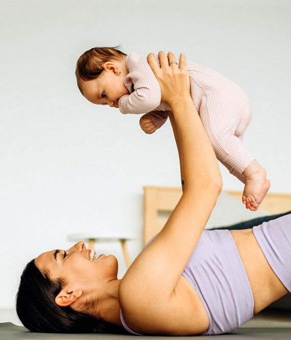 woman engaging in postpartum fitness exercises