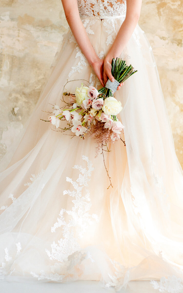 woman holding a wedding bouquet