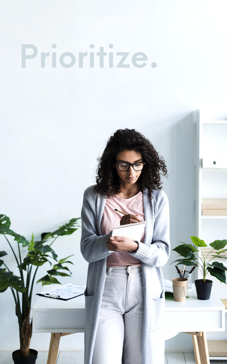 woman making plans and setting priorities