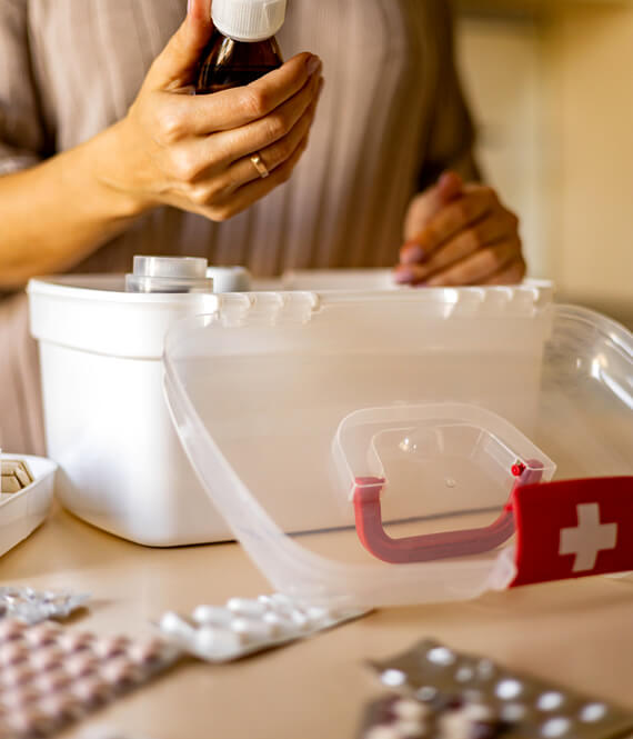 woman organizing medicine at home