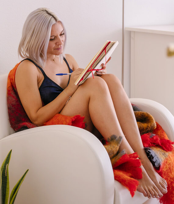 woman writing down her family insurance plan