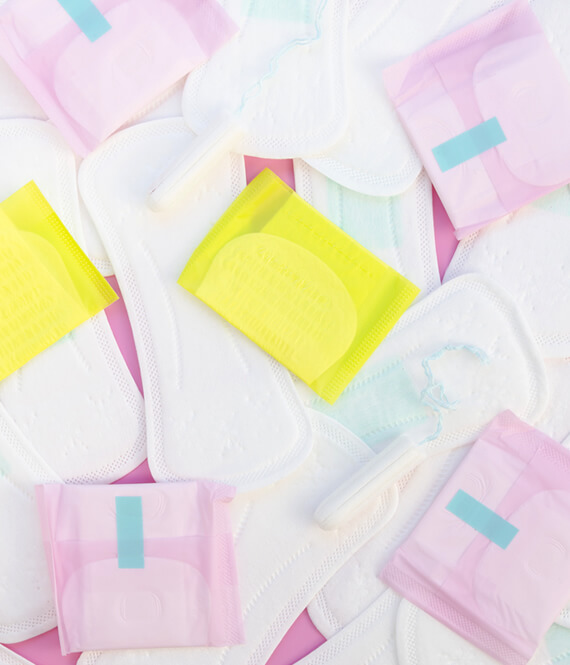 feminine sanitary pads tampons and period items as symbol of late periods