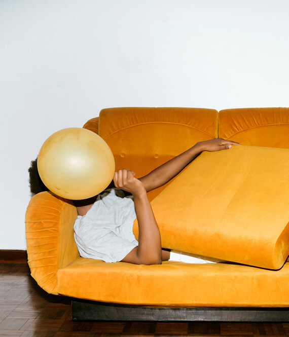 introvert person hiding themselves from the crowd
