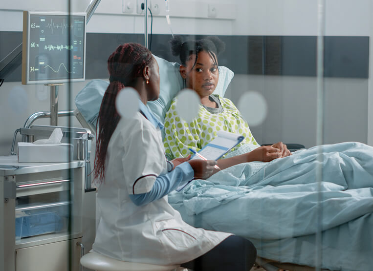 mental health nurse practitioner helping a teenage girl to calm down