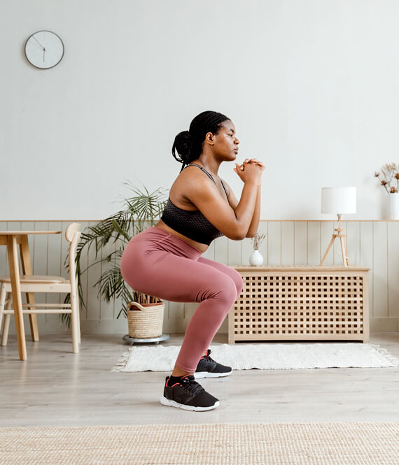 woman doing her first workout to commit to losing weight