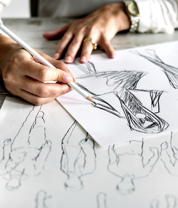 designing clothes on paper