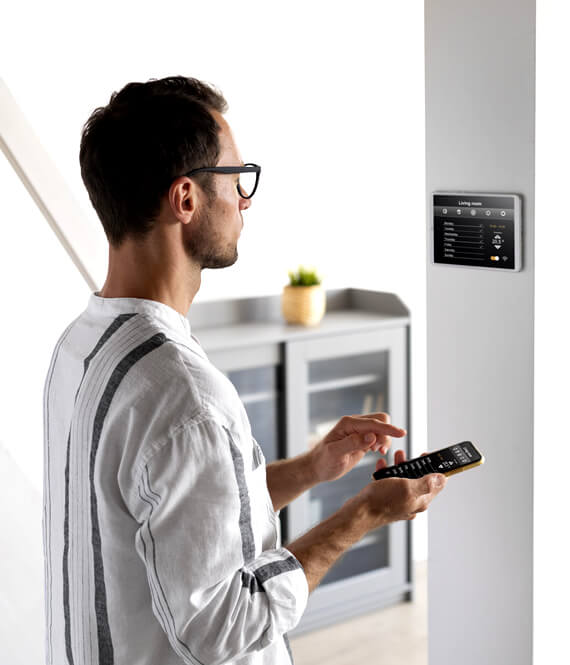 person using smart air conditioner at home