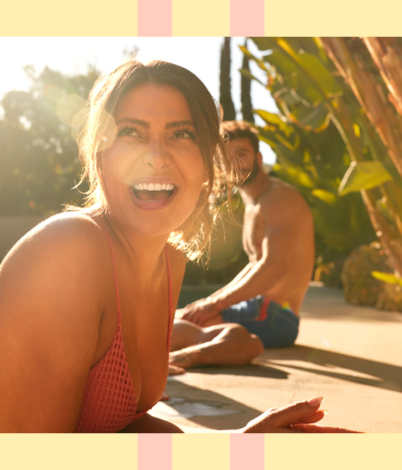 guy looking at a woman at a pool party
