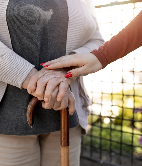 woman taking care of her elderly mother
