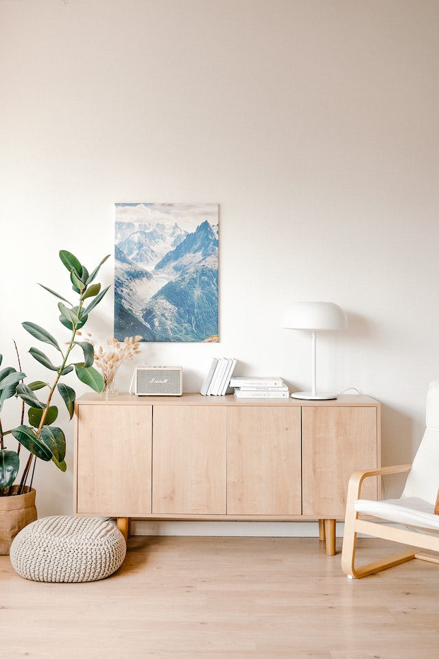 scandi style living space with light wood floors and light wood furniture