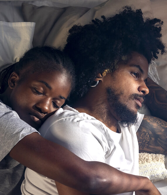 woman caring for her sick spouse