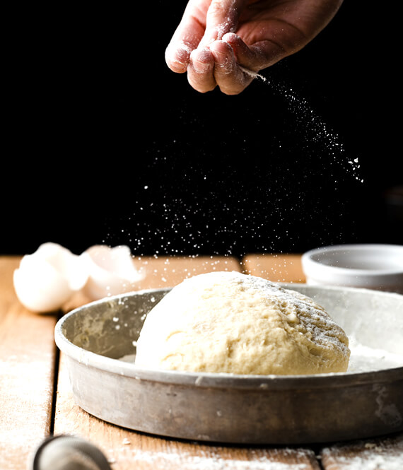 chef preparing dough with nutritional yeast for yeast health benefits