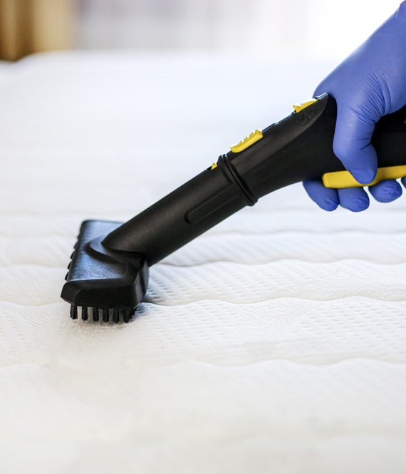 mattress care - cleaning a mattress with a vacuum cleaner