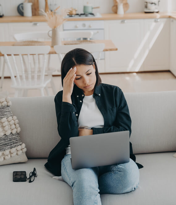 puzzled female who has trouble focusing at her task