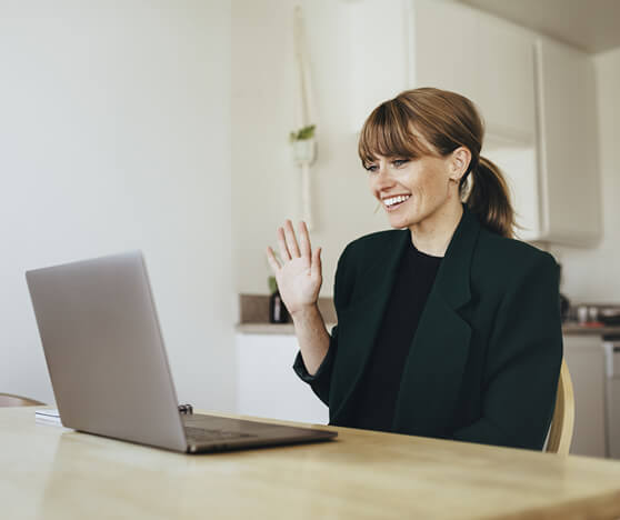 woman having a video call with her friends to combat loneliness