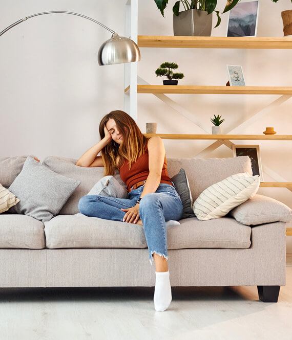 woman sitting in a mental health friendly room