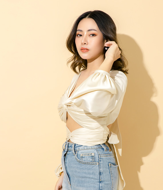 asian model as a symbol of cosmetic plastic surgery success