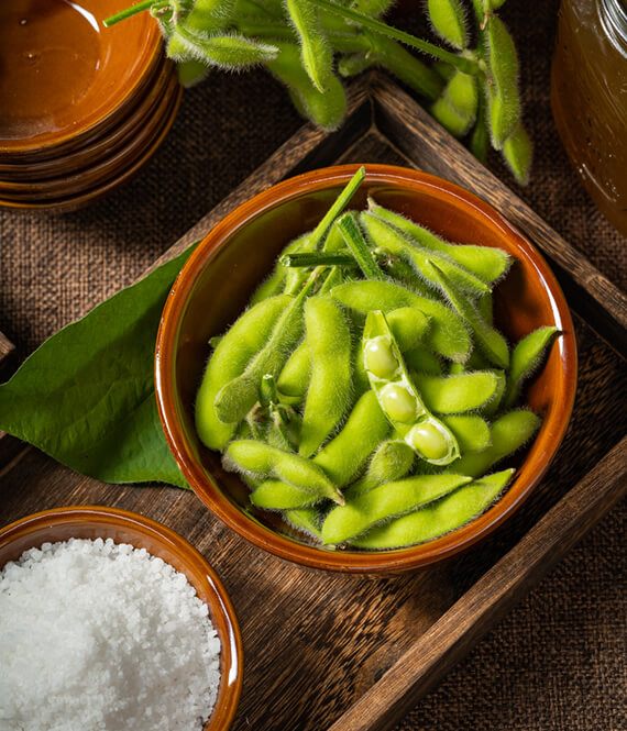 benefits of edamame - a bowl of edamame on the table
