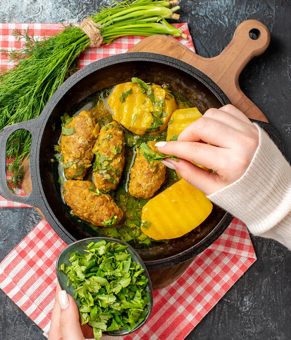 preparing a skillet meal as a form of cooking for yourself