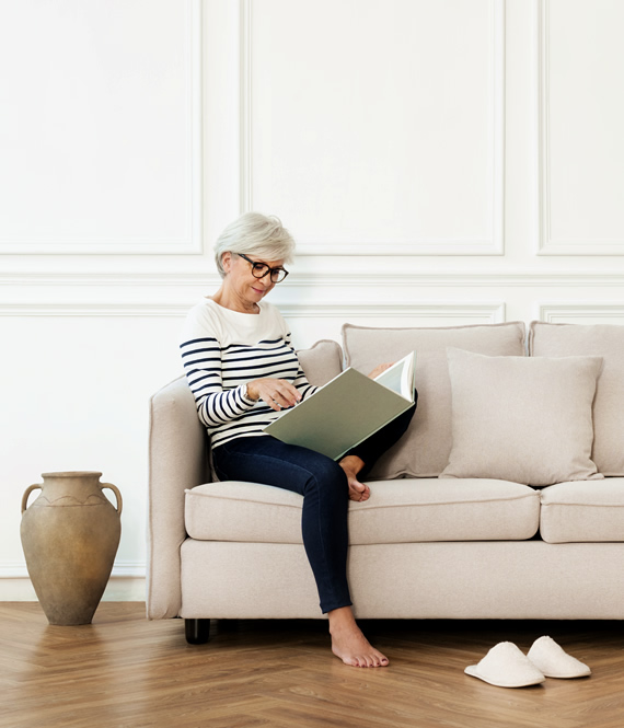 beautiful mature woman doing post work self care at home
