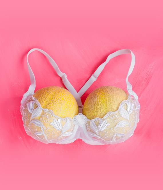 bra and melons as an art illustration of breast augmentation results