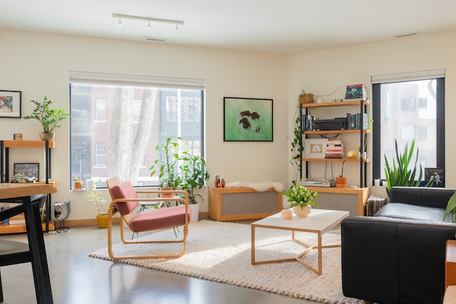 a brown sofa in a living room with an interesting room layout
