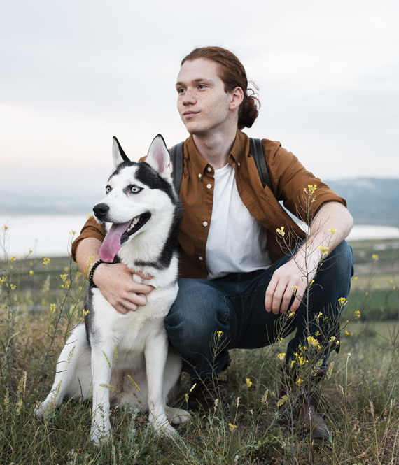 responsible pet owner with his dog