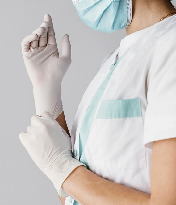 nurse putting on gloves