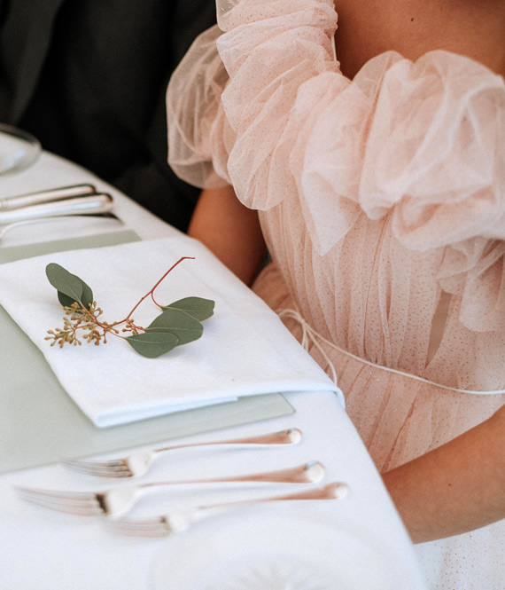 person wearing dress according to wedding guest dress code