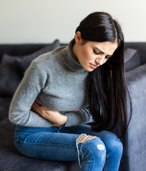 sick woman experiencing nausea