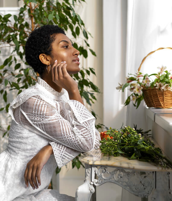 woman enjoys fresh smelling apartment