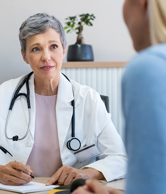 cardiologist consulting her patient