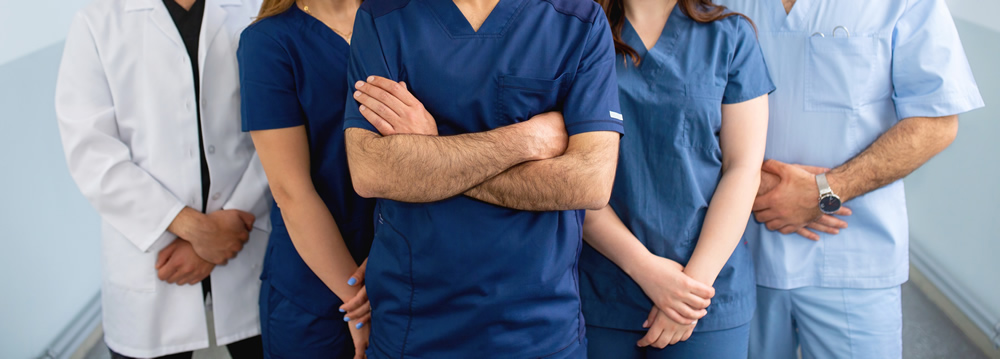 group of medical professionals in their scrubs