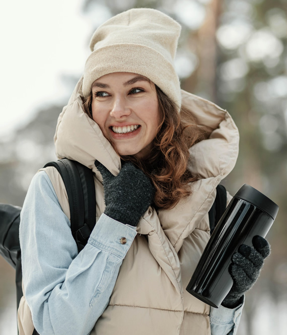 person wearing heated gloves in winter