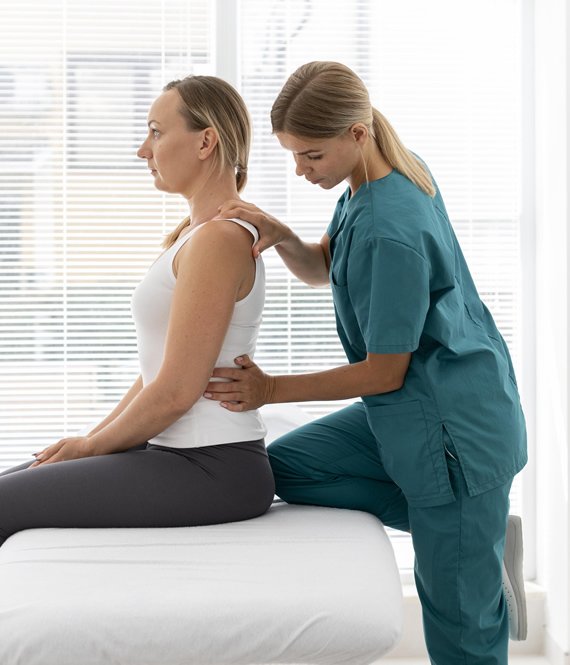 chiropractic performing lower back adjustment