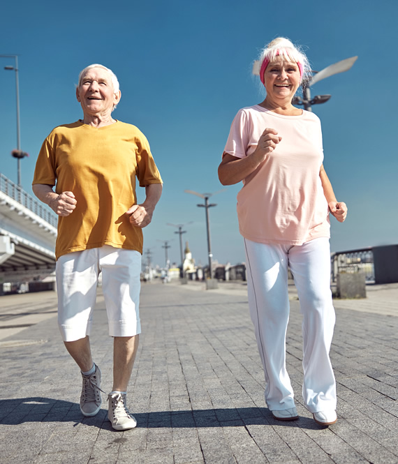 elderly people taking a walk outside
