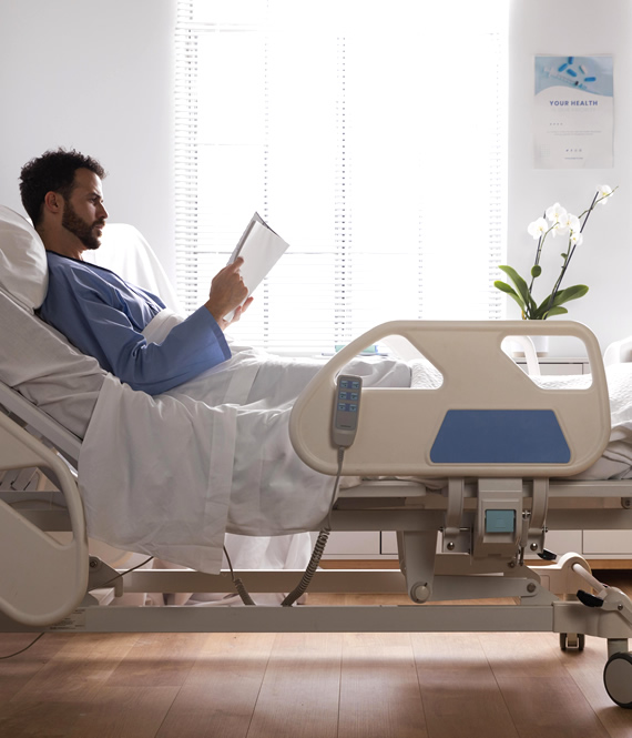 person using an at home hospital bed
