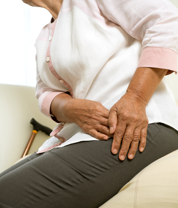elderly person experiencing hip pain