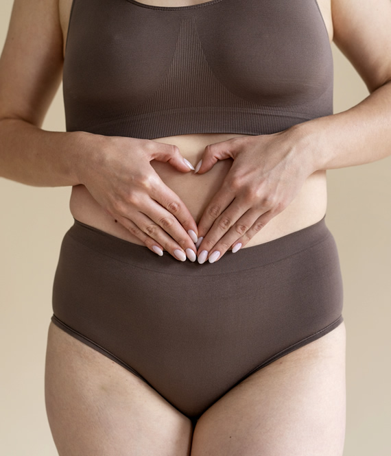 beautiful woman experiencing menopause-related stomach digestion issues