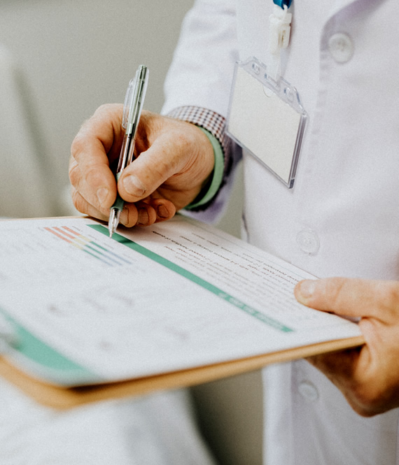 doctor reviews medical test results