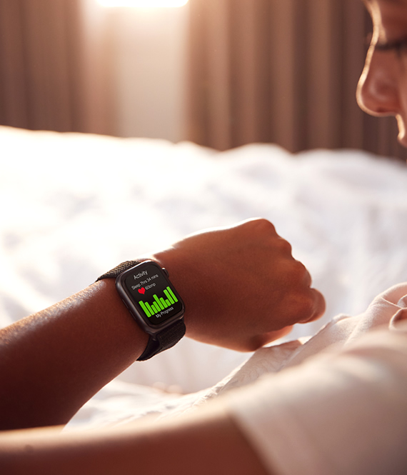 person monitors health with a smart watch