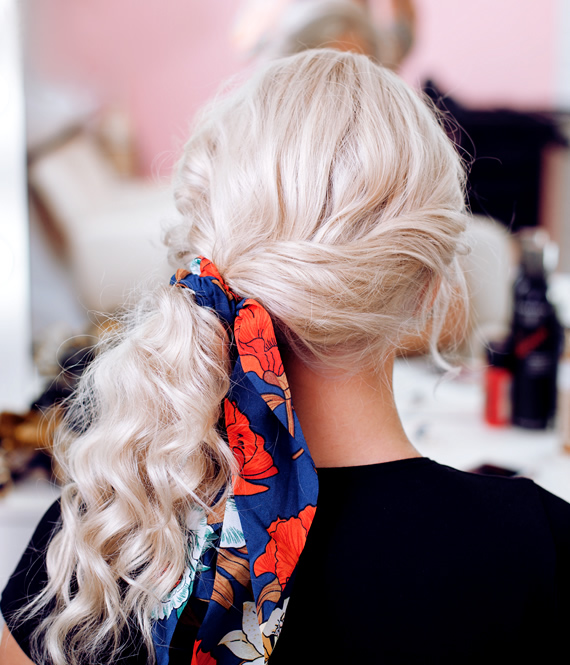 woman with platinum blonde hair braid
